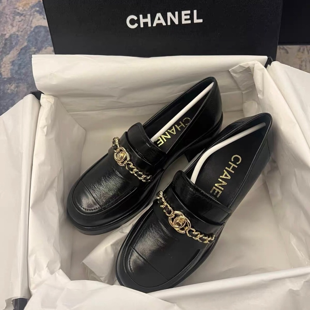 CHANEL Black Heels with Gold Chain Accent